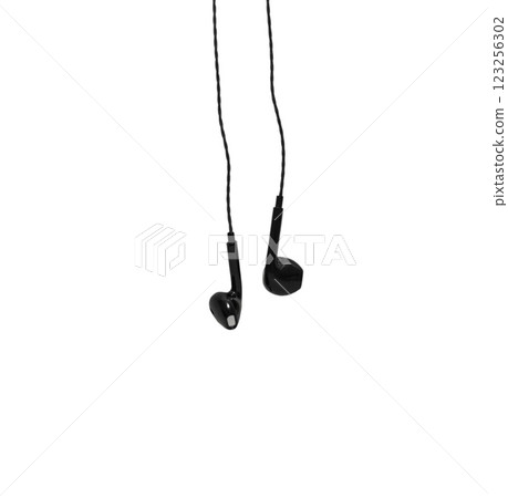 Black wired headphones isolated on white background. Modern gadgets for communication Black wired headphones isolated on white background. Modern gadgets for communication 123256302