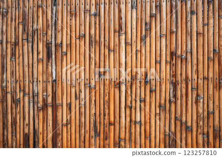 natural wooden fence background with a texture of pattern of dry bamboo 123257810