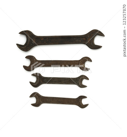 Hand tools. Carob keys of different size on white background Hand tools. Carob keys of different size on white background 123257870