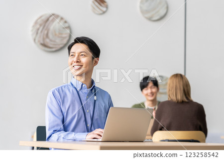 Middle-aged businessman working in an office. Photo courtesy of Sky Perfect Tokyo Media Center. Middle-aged businessman working in an office. Photo courtesy of Sky Perfect Tokyo Media Center. 123258542