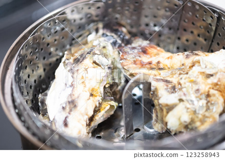 Image of oysters being steamed in a steamer (stock photo) 123258943