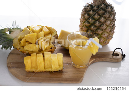 Cut pineapple and pineapple juice 123259264