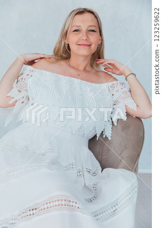 woman in summer dress smiling 123259622