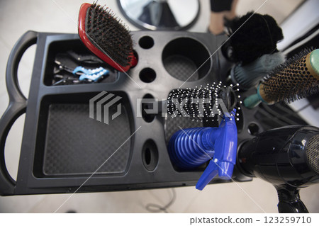 Combs, brushes and hairdryer equipment in the hairdresser 123259710