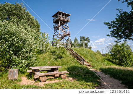 Wooden observation tower on the top of the hill in the summer 123261411