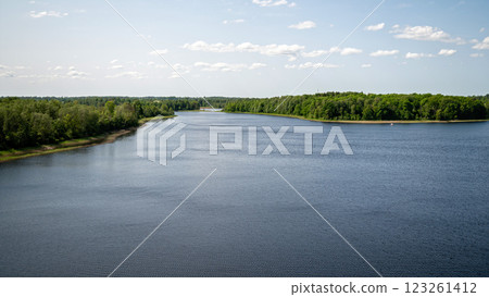 scenic view of the river in summer with blue sky and clouds 123261412
