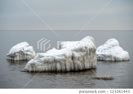 Winter landscape. Ice hummocks on the Baltic sea coast. 123261443