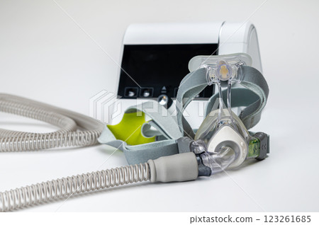 CPAP machine with mask and hose, for people with sleep apnea, respiratory, or breathing disorder CPAP machine with mask and hose, for people with sleep apnea, respiratory, or breathing disorder 123261685