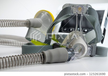 CPAP machine with mask and hose, for people with sleep apnea, respiratory, or breathing disorder CPAP machine with mask and hose, for people with sleep apnea, respiratory, or breathing disorder 123261690