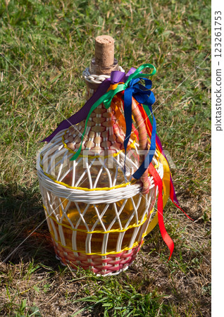 Decorated demijohns. Traditional vessels for wine and other drinks that are also used at folk festivals. South Moravia, Czech Republic. 123261753
