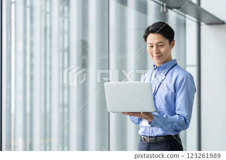 Middle-aged engineers working in an office. Photo courtesy of Sky Perfect Tokyo Media Center. 123261989