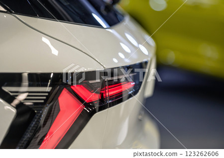 Rear red stop signal lamp on a modern car. Close-up. Selective focus. 123262606