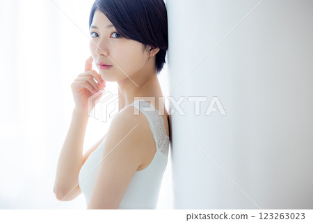 Portrait of a woman with a sad expression Portrait of a woman with a sad expression 123263023