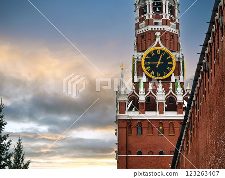 The Spasskaya Clock Tower stands proudly against the backdrop of Moscow's evening sky 123263407
