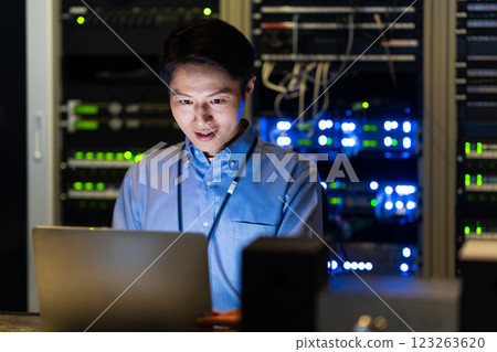 Engineers working in a data center. Photo courtesy of Sky Perfect Tokyo Media Center. Engineers working in a data center. Photo courtesy of Sky Perfect Tokyo Media Center. 123263620