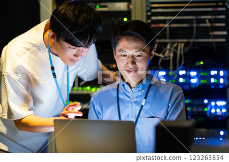 Engineers working in a data center. Photo courtesy of Sky Perfect Tokyo Media Center. 123263854