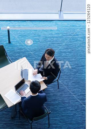Businessmen having a meeting. Photo courtesy of Sky Perfect TV Tokyo Media Center. 123264120