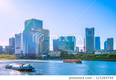New scenery of Tokyo cityscape in Japan. Water buses Himiko, Ryoma, Tachibanamaru, Takeshiba, Hamamatsucho... Tokyo Tower and Azabudai in the background. New scenery of Tokyo cityscape in Japan. Water buses Himiko, Ryoma, Tachibanamaru, Takeshiba, Hamamatsucho... Tokyo Tower and Azabudai in the background. 123264748