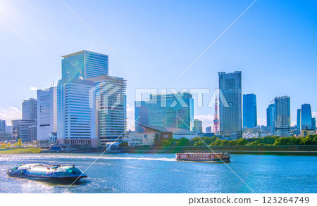 New scenery of Tokyo cityscape in Japan. Water buses Himiko, Ryoma, Tachibanamaru, Takeshiba, Hamamatsucho... Tokyo Tower and Azabudai in the background. 123264749