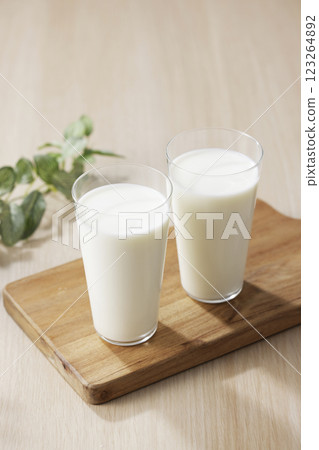 Milk poured into a glass 123264892