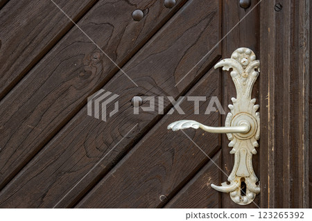 Detail of handle on the church door, Kajov, Czechia 123265392