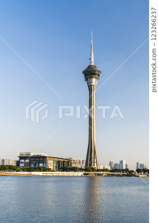 Famous traveling Macau Tower, an urban landscape near the river in Macao Asia. 123266237