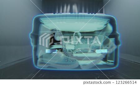 VFX Animation Visualizing Inside the Suitcase Illuminated by X-ray Metal Detector Scanning VFX Animation Visualizing Inside the Suitcase Illuminated by X-ray Metal Detector Scanning 123266514