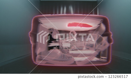 VFX Animation Visualizing Inside of the Suitcase Illuminated by X-ray Scanning. Alert of Detected Knife VFX Animation Visualizing Inside of the Suitcase Illuminated by X-ray Scanning. Alert of Detected Knife 123266517
