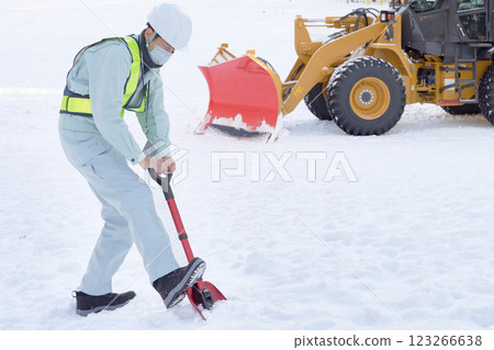 Workers shoveling snow Workers shoveling snow 123266638