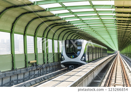 A Green Line train running on the elevated track of the Taichung Rapid Transit System in Taiwan.  A Green Line train running on the elevated track of the Taichung Rapid Transit System in Taiwan.  123266854
