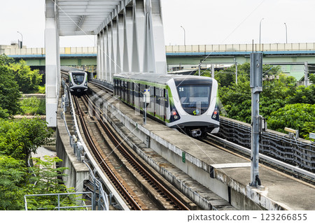 A Green Line train running on the elevated track of the Taichung Rapid Transit System in Taiwan. A Green Line train running on the elevated track of the Taichung Rapid Transit System in Taiwan. 123266855