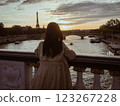 Rear view of a woman looking at the Seine River (Paris, France) 123267228