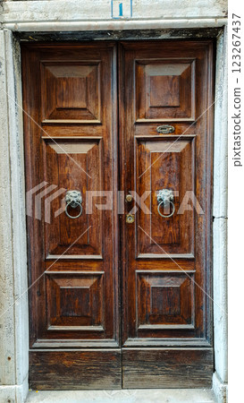Old vintage brown door on the street 123267437