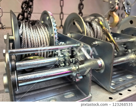 Innovative winch mechanisms showcasing dual reels and metallic precision Innovative winch mechanisms showcasing dual reels and metallic precision 123268535
