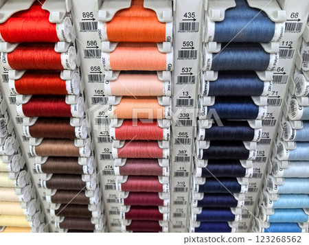 Colorful threads organized neatly for creative sewing projects at a craft store 123268562