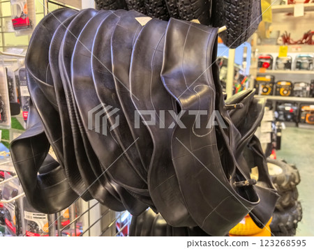Creative display of bicycle inner tubes at a vibrant local shop Creative display of bicycle inner tubes at a vibrant local shop 123268595
