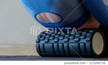 Black MFR roller for body. Recovery massage. MFR roll for rehabilitation and health. Black MFR roller for body. Recovery massage. MFR roll for rehabilitation and health. 123268730