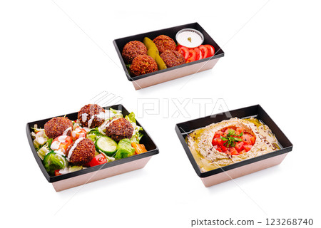 Mouthwatering falafel dishes on display with fresh ingredients Mouthwatering falafel dishes on display with fresh ingredients 123268740