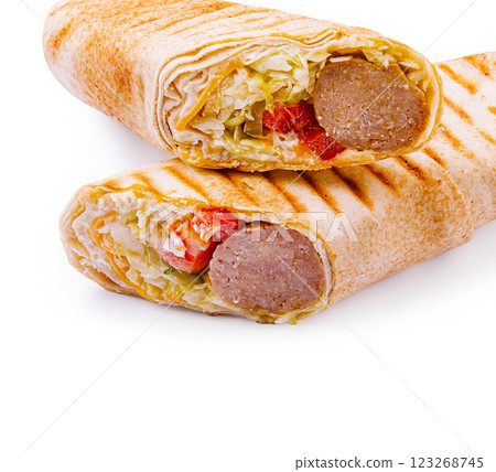 Delicious grilled wraps filled with fresh ingredients and sausage 123268745