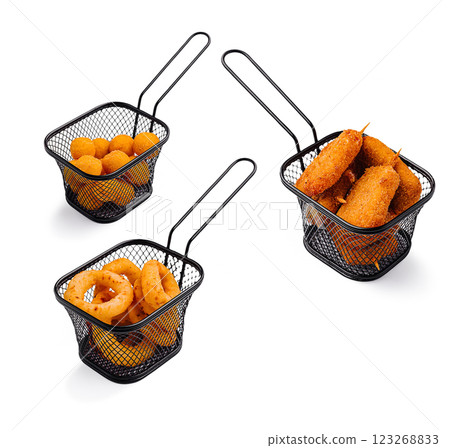 Delicious fried snacks in small baskets served at a party 123268833