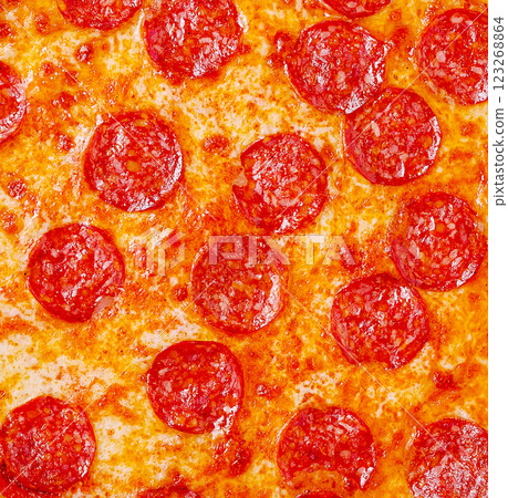 Hot pepperoni pizza fresh out of the oven with melted cheese Hot pepperoni pizza fresh out of the oven with melted cheese 123268864