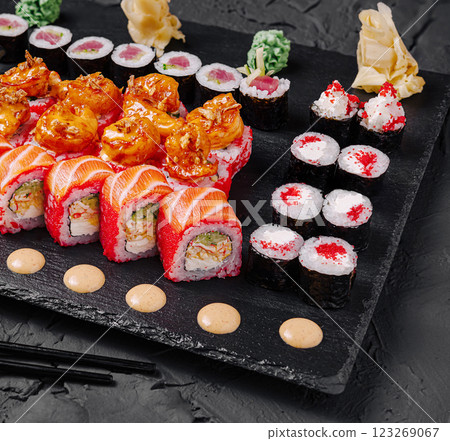 Colorful sushi platter with shrimp tempura and fresh fish Colorful sushi platter with shrimp tempura and fresh fish 123269067