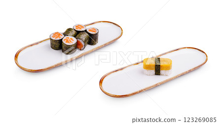 Sushi platter featuring colorful rolls and a unique block piece Sushi platter featuring colorful rolls and a unique block piece 123269085