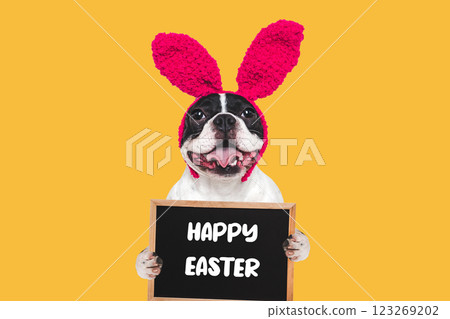 Happy Easter. Cute puppy and congratulatory inscription 123269202