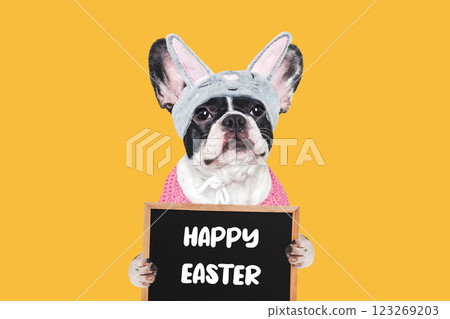 Happy Easter. Cute puppy and congratulatory inscription 123269203