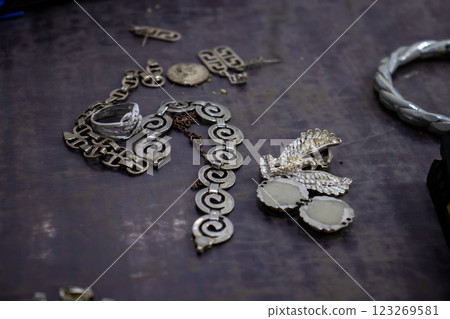Elaboration of handmade jewelry at the archaeological site of Teotihuacan. Metal casting. 123269581
