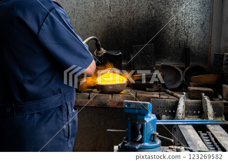 Elaboration of handmade jewelry at the archaeological site of Teotihuacan. Metal casting. Elaboration of handmade jewelry at the archaeological site of Teotihuacan. Metal casting. 123269582