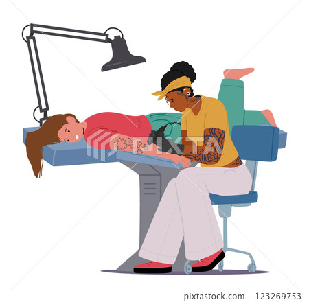 Woman tattoo master drawing ink body art adornment on client skin with electric needle scene Woman tattoo master drawing ink body art adornment on client skin with electric needle scene 123269753