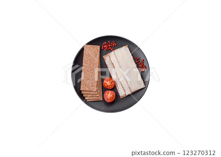 Rectangular whole grain crisp bread with cream cheese Rectangular whole grain crisp bread with cream cheese 123270312