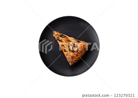Pieces of quiche with salmon, spinach or broccoli, salt and spices Pieces of quiche with salmon, spinach or broccoli, salt and spices 123270321